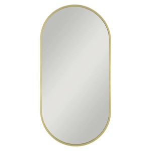 Owalne lustro w złotej ramie.