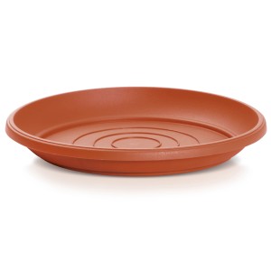 Brązowa podstawka pod doniczkę t.b.t., wykonana z tworzywa sztucznego.