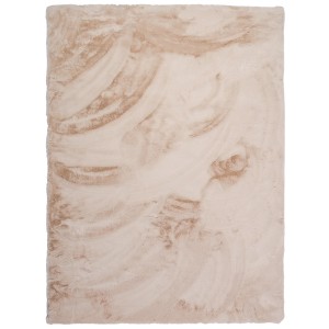 Beżowy dywan shaggy z marmurkowym wzorem.