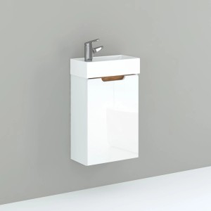 Biała umywalka t.b.t. z szafką jako część zestawu mebli łazienkowych.