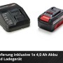 Akumulator i ładowarka Einhell Power X-Change do kosiarki akumulatorowej.