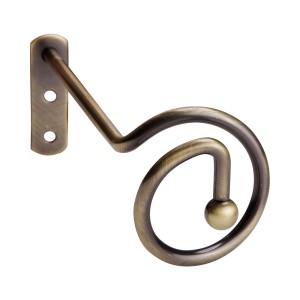 Dekoracyjna końcówka karnisza w kolorze brązu.