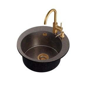 Okrągły zlewozmywak granitowy t.b.t. w kolorze szarym ze złotą baterią i dozownikiem mydła.