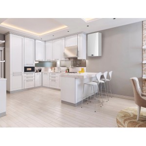 Biały kocioł t.b.t. w nowoczesnej kuchni z białymi meblami.