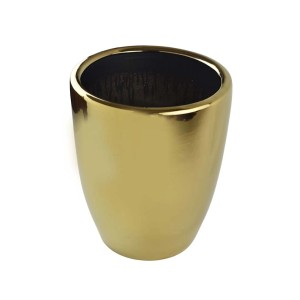 Złota doniczka t.b.t. do kwiatów doniczkowych.