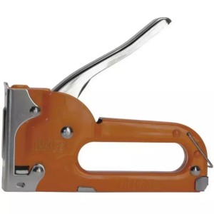 Pomarańczowy zszywacz do majsterkowania i projektów rękodzielniczych.