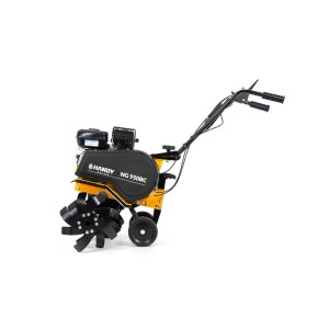 Żółto-czarny glebogryzark spalinowy t.b.t. do prac ogrodowych.