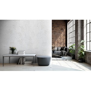 Przestrzeń mieszkalna z aranżacją ścian farbą efektową. Salon z ceglaną ścianą i oknem.