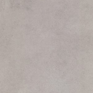 Szara płytka podłogowa t.b.t. o matowym wykończeniu.