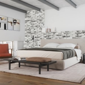 Aranżacja ściany sypialni z szarymi kamieniami dekoracyjnymi t.b.t.