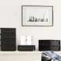 Czarny Eurobox-System Box z pełną ścianą, 40x30x22 cm, ułożone w stos i pojedynczo na stole.