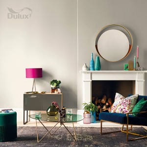 Pokój dzienny pomalowany kolorem. Kolory ścian od t.b.t. w nowoczesnym otoczeniu.