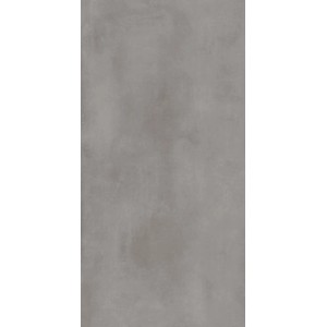 Szara płytka podłogowa t.b.t. o matowym wykończeniu.