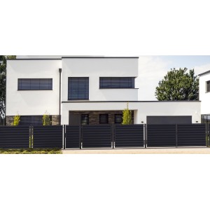 Nowoczesny dom z czarnym metalowym ogrodzeniem kategorii t.b.t.