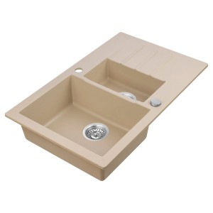 Beżowy zlewozmywak granitowy t.b.t. z dwiema komorami i ociekaczem.