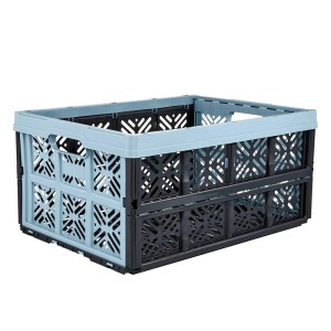 Składany pojemnik w kolorze niebieskim i czarnym, idealny do przechowywania.