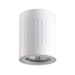 Biały reflektor sufitowy t.b.t. Spoty, cylindryczny kształt.