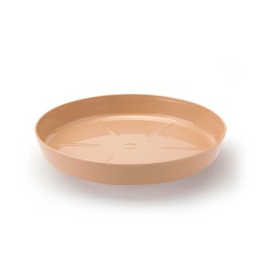 Beżowa podstawka pod doniczkę t.b.t., wykonana z tworzywa sztucznego.