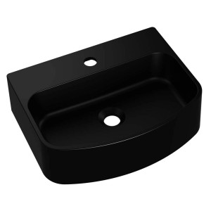 Czarna umywalka nablatowa t.b.t. do łazienki.