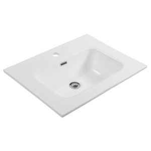 Prostokątna umywalka nablatowa t.b.t. ceramiczna w kolorze białym.