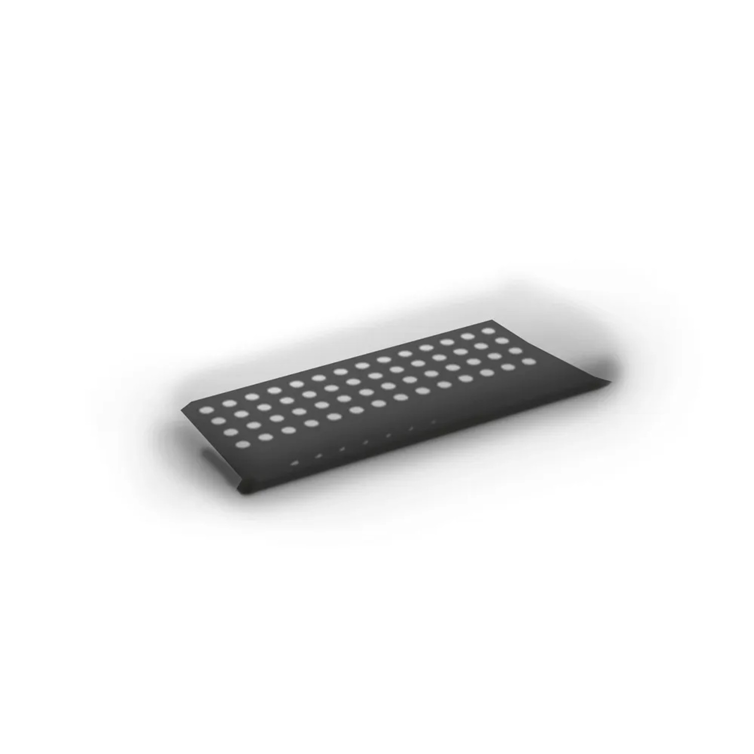 Czarna płyta t.b.t. z wzorem otworów.