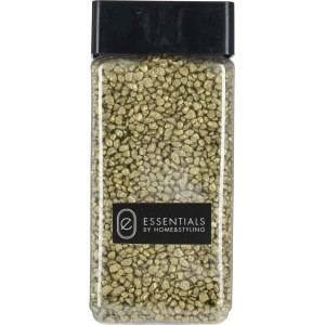 Złoty żwir ozdobny w przezroczystym pojemniku. Kamienie dekoracyjne do domu i ogrodu.