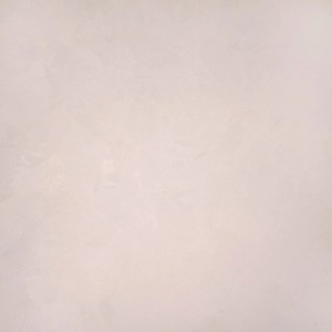 Jasnobeżowa farba efektowa do ścian.