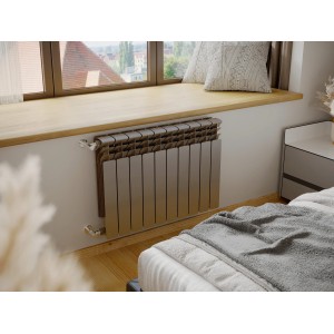 Grzejnik t.b.t. w nowoczesnej sypialni.