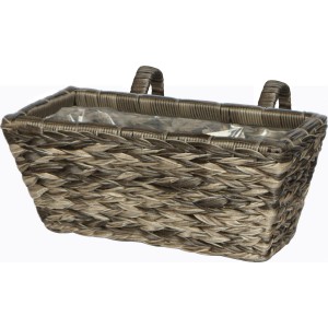 Dekoracyjna skrzynka na kwiaty wykonana z plecionego materiału do użytku na zewnątrz.