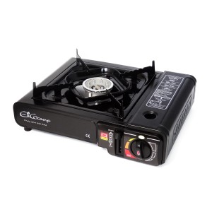 Czarna kuchenka gazowa do kempingu i aktywności na świeżym powietrzu.