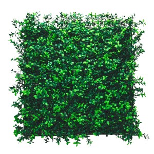 Zielona, kwadratowa mata t.b.t. na ogrodzenie. Dekoracyjny wygląd żywopłotu.