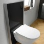 Zestaw WC wiszącego ze spłuczką w kolorze czarnym i białą ceramiką do nowoczesnych łazienek.
