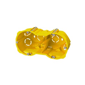 Żółta puszka podtynkowa t.b.t. do instalacji elektrycznych.