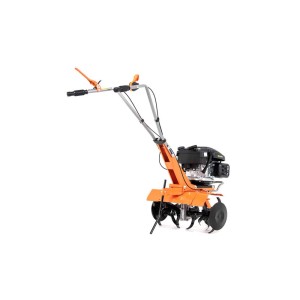 Pomarańczowy glebogryzarka spalinowa do uprawy gleby w ogrodzie.
