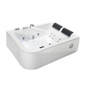 Biała wanna z hydromasażem t.b.t. z armaturą i zagłówkami.