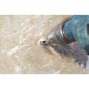 Wiertło diamentowe LUX (8 mm) wierci otwór w płytce. Zawiera prowadnicę dla precyzyjnego wiercenia.