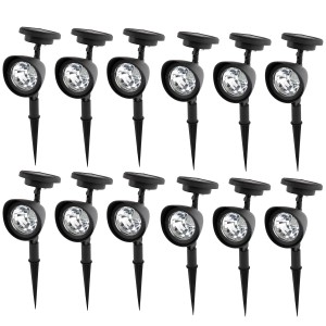 Zestaw czarnych lamp solarnych do oświetlania ścieżek ogrodowych.