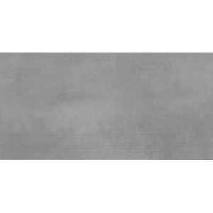 Zbliżenie szarej listwy przypodłogowej lub płytki schodowej.