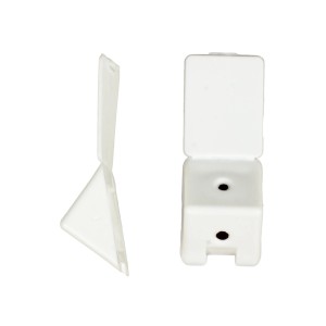 Białe łączniki meblowe t.b.t. do półek i szafek.