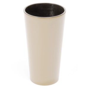 Beżowa doniczka t.b.t. do roślin domowych i kwiatów.