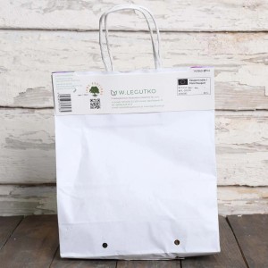 Biała papierowa torba z cebulkami kwiatowymi od W. Legutko.