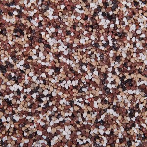 Zbliżenie tynku t.b.t. z czerwonymi, białymi i brązowymi kamieniami.