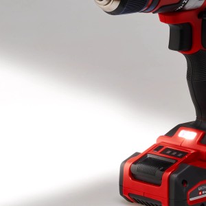 Czerwona wiertarko-wkrętarka akumulatorowa t.b.t. ze światłem LED dla majsterkowiczów.