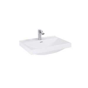 Biała umywalka nablatowa t.b.t. z baterią do łazienki.