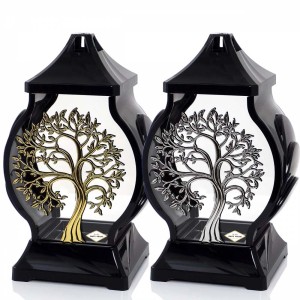 Dwa czarne znicze z motywem drzewa (złoty/srebrny) na nastrojowe groby.