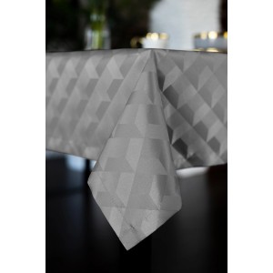 Szary obrus ze wzorem geometrycznym.