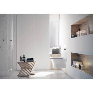 Nowoczesna łazienka z wiszącą miską WC t.b.t. w kolorze białym. Stylowy design.