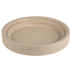 Beżowa podstawka pod doniczkę t.b.t., okrągła.