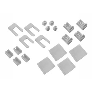 Zestaw akcesoriów do rolet: kształty U, zębatki, wsporniki i powierzchnie klejące.